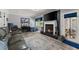 Bright living area with fireplace, comfortable seating, and access to the backyard at 1467 Hewatt Rd, Lilburn, GA 30047