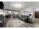 Open concept living space featuring the living room, dining room, and kitchen at 1467 Hewatt Rd, Lilburn, GA 30047