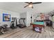 Large recreation room with exercise equipment, pool table, and ample space for entertainment at 1467 Hewatt Rd, Lilburn, GA 30047
