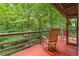 An inviting porch showcasing wooded views perfect for relaxing outdoors at 2016 Castleway Ne Dr, Atlanta, GA 30345