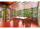 Charming dining space with expansive windows providing natural light and views of the surrounding landscape at 2016 Castleway Ne Dr, Atlanta, GA 30345
