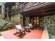 Comfortable outdoor patio with chairs and wooded views at 2016 Castleway Ne Dr, Atlanta, GA 30345
