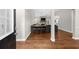 Bright entryway leading to the living area with modern decor at 7610 Golden Sands Dr, Cumming, GA 30041