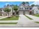 Charming townhomes feature stone accents, attached garages, and manicured front lawns at 146 Bellehaven Dr, Woodstock, GA 30188