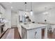 Well-appointed kitchen showcasing granite countertops, stainless steel appliances, and a sizable center island at 146 Bellehaven Dr, Woodstock, GA 30188