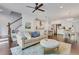 Spacious living room with hardwood floors and an open concept design at 146 Bellehaven Dr, Woodstock, GA 30188
