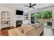 Comfortable living room featuring a fireplace, built-in shelving, and a sliding door to the patio at 146 Bellehaven Dr, Woodstock, GA 30188