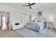 Spacious main bedroom featuring a comfortable bed, and stylish decor at 146 Bellehaven Dr, Woodstock, GA 30188