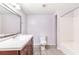 Bathroom featuring a vanity with drawers, toilet and shower-tub combination at 3556 Riley Rd, Douglasville, GA 30134