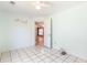Bright bedroom with ceiling fan, tile floors, and cute wall decor at 3556 Riley Rd, Douglasville, GA 30134