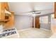 Functional kitchen featuring tile floors, wooden cabinets, and appliances ready for culinary adventures at 3556 Riley Rd, Douglasville, GA 30134