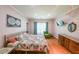 Bedroom with hardwood floors and ensuite bath at 58 Bisbee Se Ave, Atlanta, GA 30315