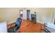 Comfortable bedroom showcasing a decorative fireplace and hardwood floors at 58 Bisbee Se Ave, Atlanta, GA 30315