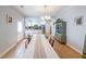 Charming dining room with tiled floors and open access to the kitchen at 58 Bisbee Se Ave, Atlanta, GA 30315