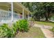 Charming home with a welcoming porch, complete with chairs and landscaped greenery at 58 Bisbee Se Ave, Atlanta, GA 30315