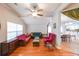 Comfortable living area with hardwood floors, ceiling fan, and view into kitchen at 58 Bisbee Se Ave, Atlanta, GA 30315
