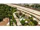 Wide aerial shot of community with swimming pool, parking, trees and city in the background at 791 Wylie Se St # 404, Atlanta, GA 30316