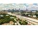 Wide aerial shot of community with city skyline in the background. Neighborhood locations labeled at 791 Wylie Se St # 404, Atlanta, GA 30316