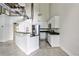 Bright, modern kitchen with stainless steel appliances and a breakfast bar at 791 Wylie Se St # 404, Atlanta, GA 30316