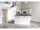 Bright kitchen with stainless steel appliances and a kitchen island at 791 Wylie Se St # 404, Atlanta, GA 30316