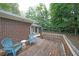 Inviting backyard deck with outdoor seating and wooded views at 1327 Rupert Rd, Decatur, GA 30030