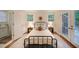 Cozy bedroom with natural light, a decorative area rug, and access to a bathroom at 1327 Rupert Rd, Decatur, GA 30030