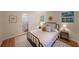 Bedroom with wood floors, neutral walls, and natural light from two windows at 1327 Rupert Rd, Decatur, GA 30030