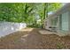 A clean backyard with a patio and partial fence, great for relaxing at 1735 Carter Cir, Atlanta, GA 30344
