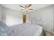 Bedroom featuring a fan, closet, and light-filled windows at 1735 Carter Cir, Atlanta, GA 30344