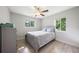Bedroom with two windows providing natural light and a ceiling fan at 1735 Carter Cir, Atlanta, GA 30344