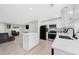 Spacious kitchen with stainless steel appliances and a view of the living area at 1735 Carter Cir, Atlanta, GA 30344