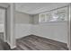Basement featuring modern flooring, neutral paint color, and fresh white trim at 6503 Tent Valley Dr, Riverdale, GA 30296