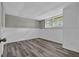 Finished basement featuring modern flooring, wainscoting, and a bright, airy feel at 6503 Tent Valley Dr, Riverdale, GA 30296