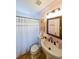 Cozy bathroom featuring a pedestal sink and shower with decorative curtain at 2 Collier Nw Rd # 5, Atlanta, GA 30309