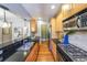 Spacious kitchen with granite countertops, stainless steel appliances, and hardwood flooring at 2 Collier Nw Rd # 5, Atlanta, GA 30309