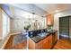 Charming kitchen with breakfast bar, wood cabinets, and stainless steel appliances at 2 Collier Nw Rd # 5, Atlanta, GA 30309