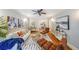 Stylish living room featuring hardwood floors, modern furniture, artwork and an open view to the kitchen at 2 Collier Nw Rd # 5, Atlanta, GA 30309