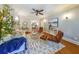 Stylish living room featuring hardwood floors, modern furniture, artwork and lots of natural light at 2 Collier Nw Rd # 5, Atlanta, GA 30309