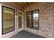 Private deck with brick and wood construction features large windows offering lots of natural light at 540 Fisher Dr # 46, Alpharetta, GA 30009