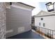 Private balcony offering a relaxing outdoor space with views of the surrounding neighborhood architecture and greenery at 540 Fisher Dr # 46, Alpharetta, GA 30009
