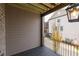 Outdoor balcony with dark deck overlooks a brick wall at 540 Fisher Dr # 46, Alpharetta, GA 30009