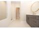 Modern bathroom with a sleek vanity, marble countertop, modern fixtures, and glass-enclosed shower at 540 Fisher Dr # 46, Alpharetta, GA 30009