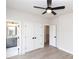 Spacious bedroom with wood floors, ceiling fan, double closets, and an en-suite bathroom for added privacy at 540 Fisher Dr # 46, Alpharetta, GA 30009