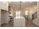 Spacious kitchen with a large center island, stainless steel range and a wine bar at 540 Fisher Dr # 46, Alpharetta, GA 30009