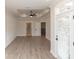Spacious area features light wood-style flooring, a trey ceiling with fan, and easy access to the outdoors through a glass door at 540 Fisher Dr # 46, Alpharetta, GA 30009