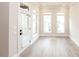 Bright living room with neutral walls, light floors, and large windows for ample natural light at 540 Fisher Dr # 46, Alpharetta, GA 30009