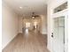 Spacious living area leading to a modern kitchen with a large island and natural light at 540 Fisher Dr # 46, Alpharetta, GA 30009