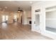 Open-concept living space leads to a stylish kitchen and fireplace at 540 Fisher Dr # 46, Alpharetta, GA 30009