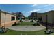 Serene outdoor lounge area with green umbrellas and comfortable seating arrangements at 540 Fisher Dr # 46, Alpharetta, GA 30009
