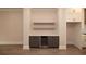 Modern wine bar with floating shelves and stainless steel beverage cooler at 540 Fisher Dr # 46, Alpharetta, GA 30009